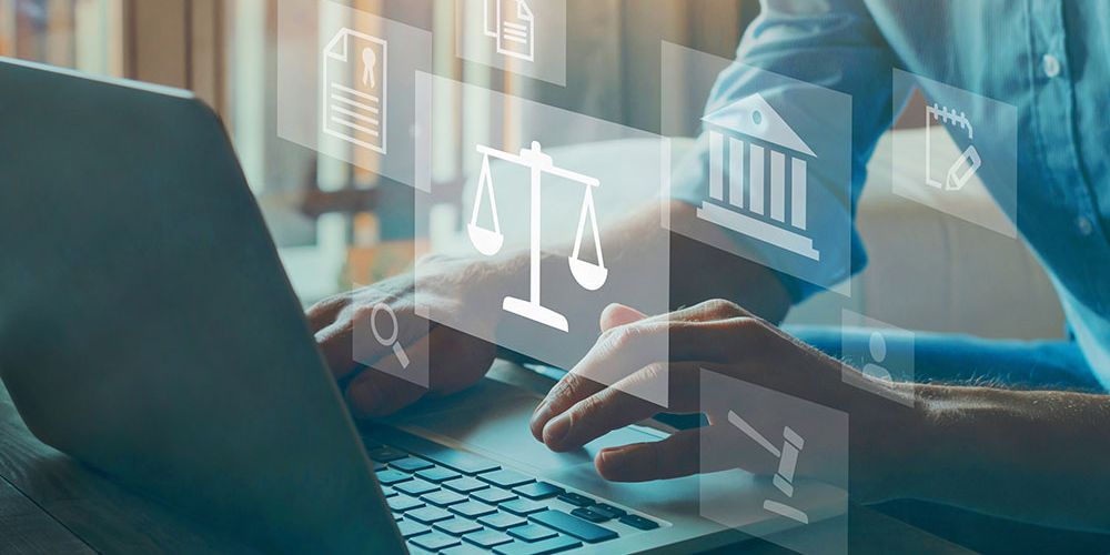 An image of a man on his computer representing business litigation