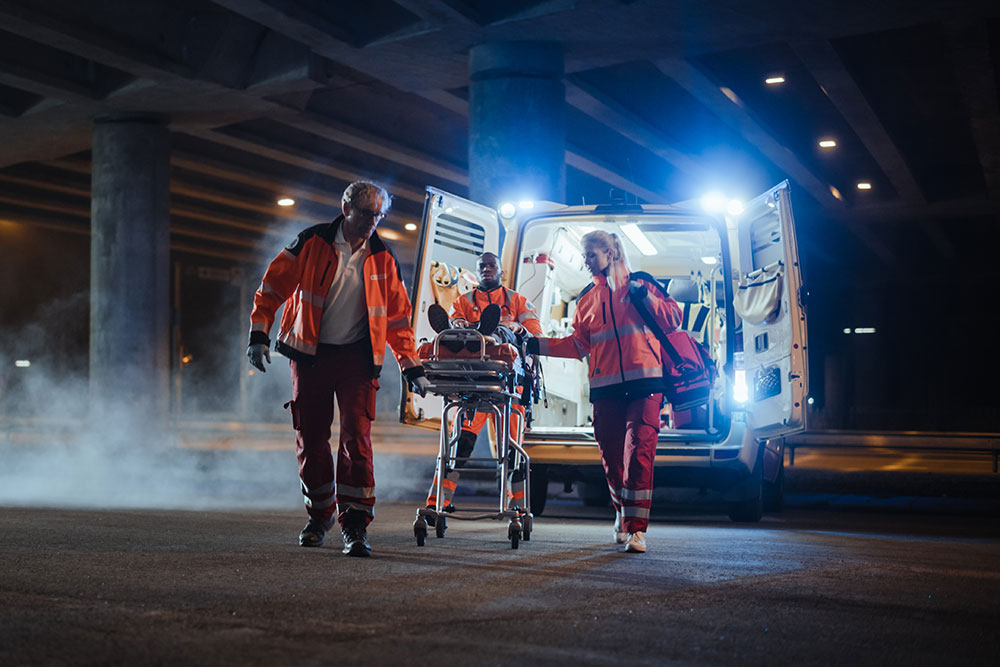 EMS teams working a violent accident