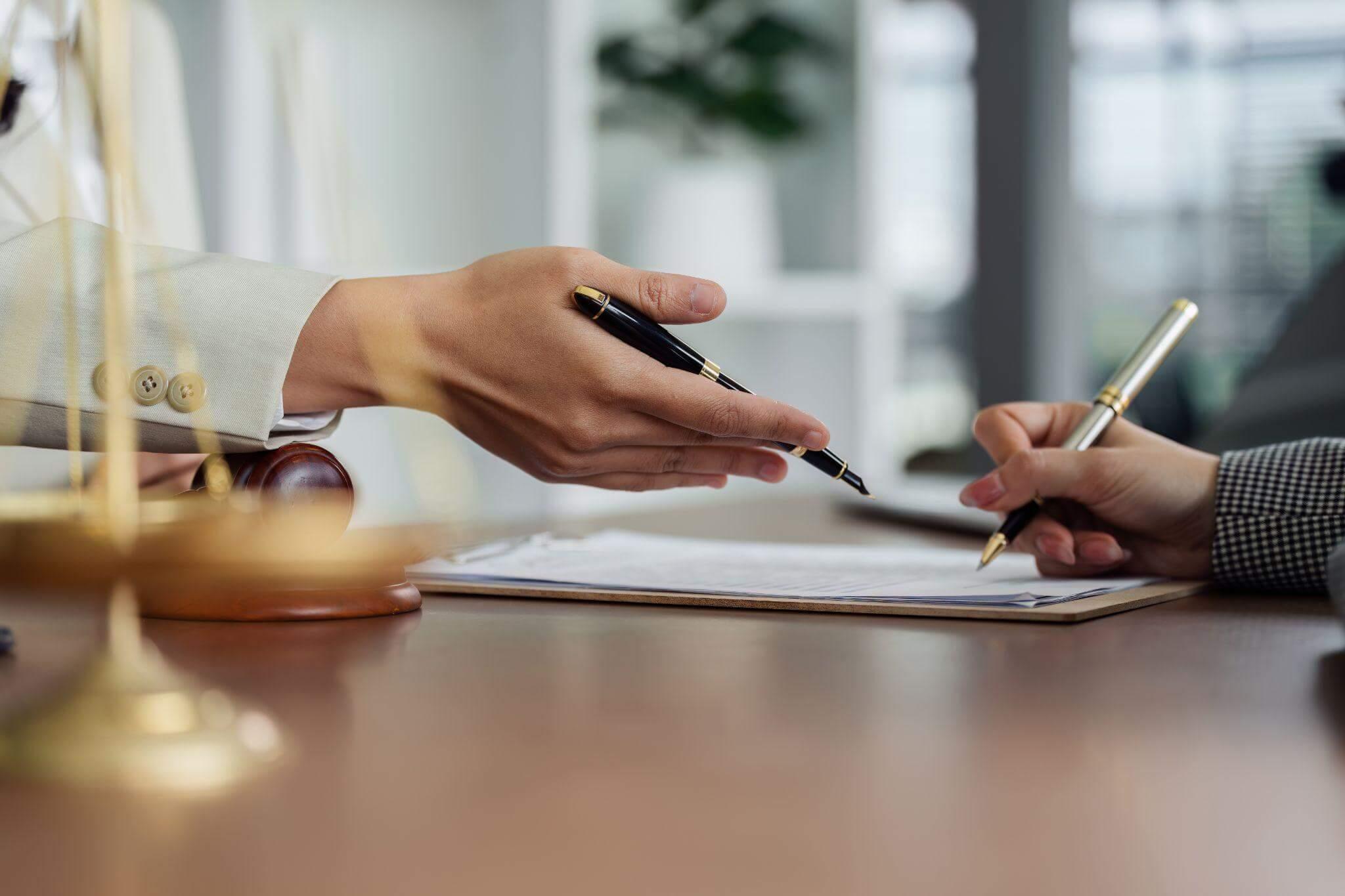 Two people sitting at a table, possibly for a