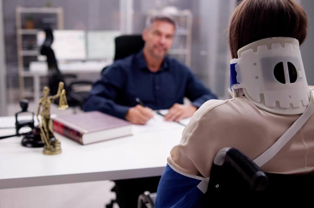 Man at desk reviewing medical records for a personal injury